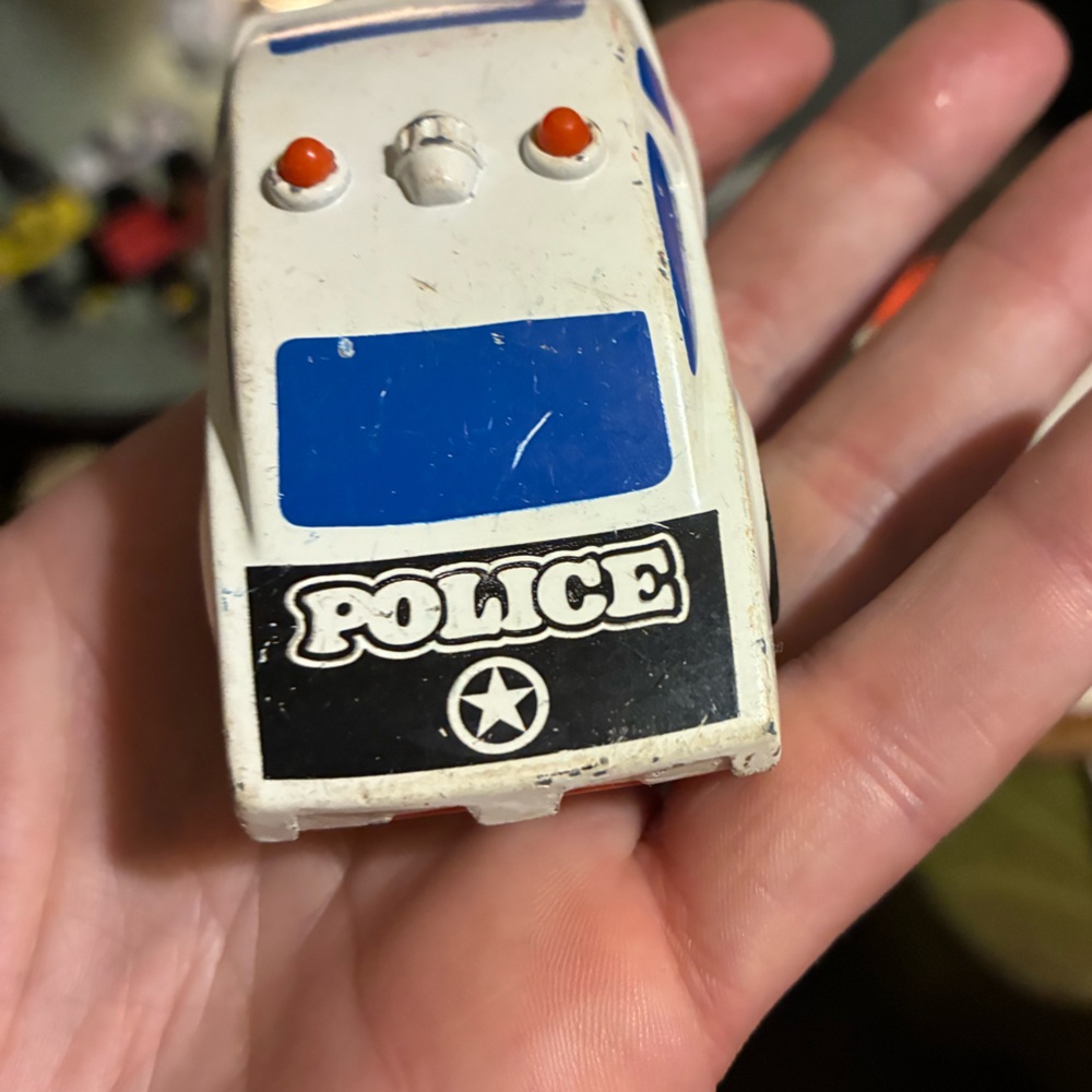 Police Toy Car with Blue and White Design